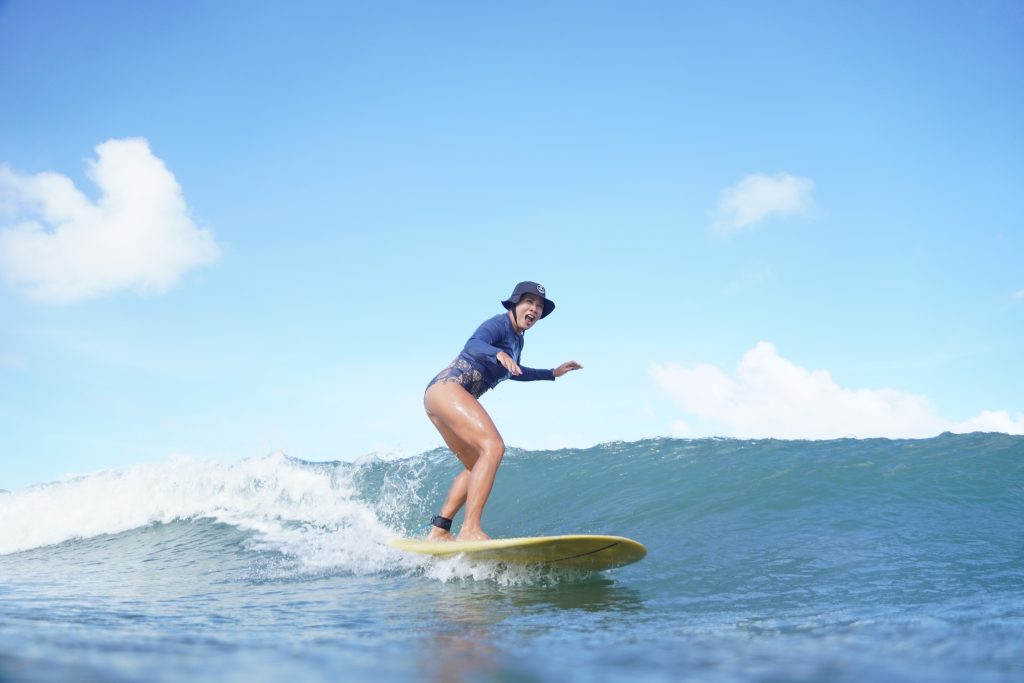 Baby Reef Sanur - Surf Journey Bali A learner enjoying one of the best bali surf spots for beginners at Baby Reef, Sanur