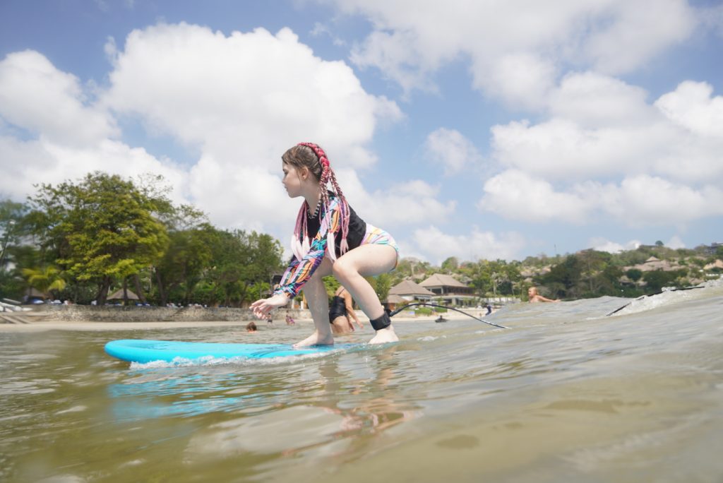 Muaya Beach (Jimbaran Bay) - Surf Journey Bali Kids learning to surf at Muaya Beach Jimbaran with Surf Journey Bali