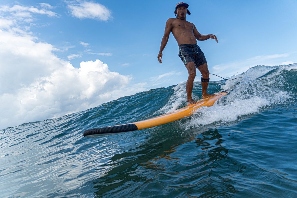 Surf journey bali surf instructor surfing in style at Balian surf spot