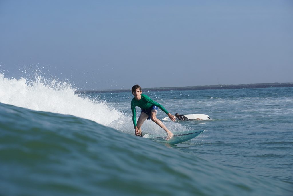 Surf Journey Bali student maneuvering Balangan waves A Surf Journey Bali student maneuvering through the waves at Balangan Beach.